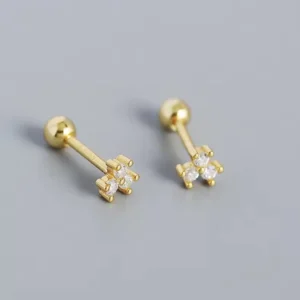 Crystal clear zircon stud jewelry with brilliant sparkle and polished metal setting.