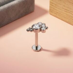 Astra Labret Ear Stud featuring a star-shaped cubic zirconia design in hypoallergenic titanium.