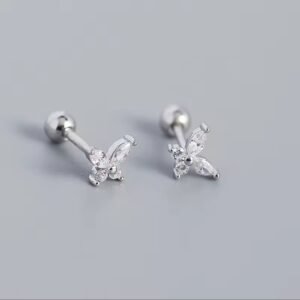 Close-up of a delicate 925 sterling silver butterfly ear stud. A single, hypoallergenic earring designed for lobe or cartilage piercings.